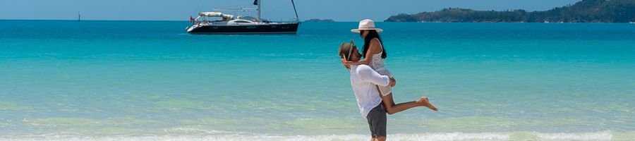 Milady, Sailing Whitsundays, Couple on Whitehaven Beach