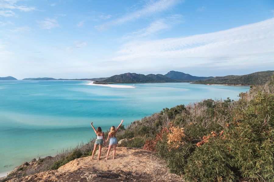 two girls posing at Hill Inlet in the Whitsundays