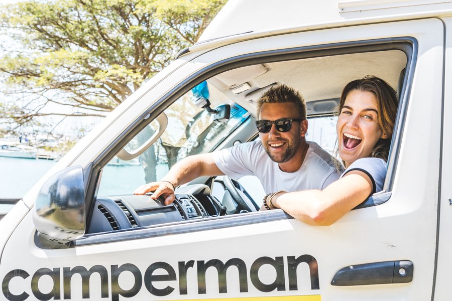 Travelling to the Whitsundays by car People in a campervan