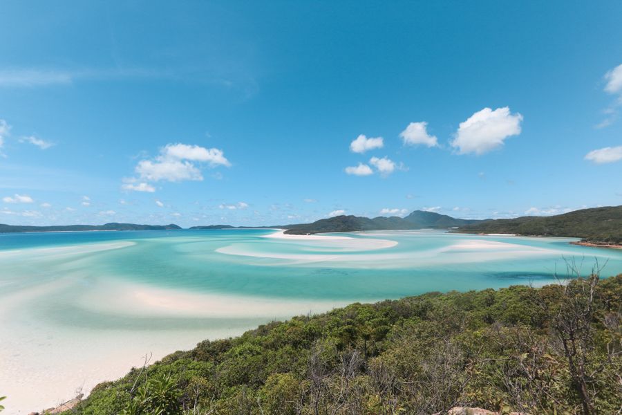 Hill Inlet Lookout A birds eye view of tree-filled islands, white sands and blue waters