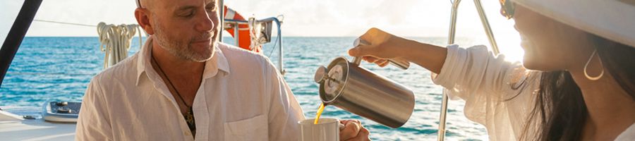 Whitsunday Blue Coffee couple having coffee on a boat in the morning