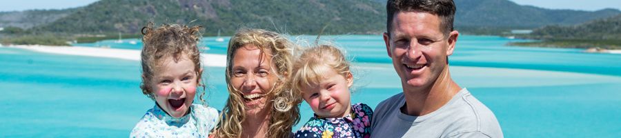 Hill Inlet Lookout Whitsundays family smiling at hill inlet lookout whitsundays