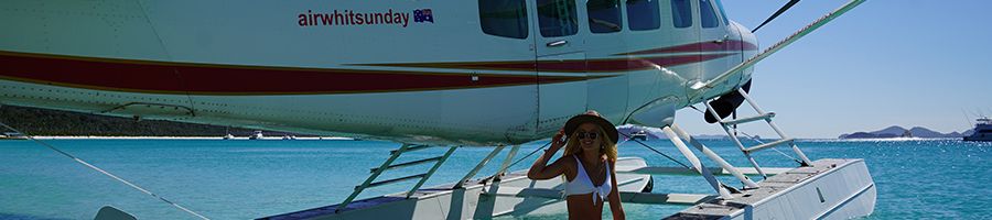 Seaplane Panorama Tour Woman sitting on plane in water