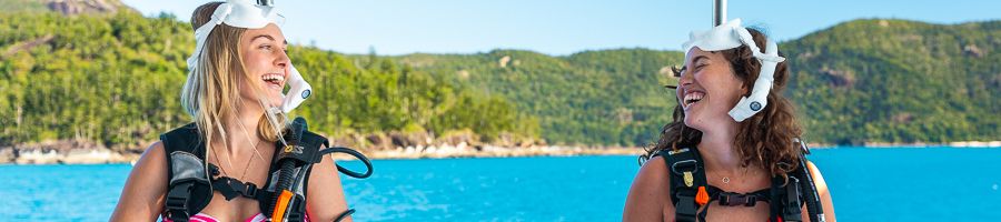 Two girls Scuba Diving in the Whitsundays, Atlantic Clipper