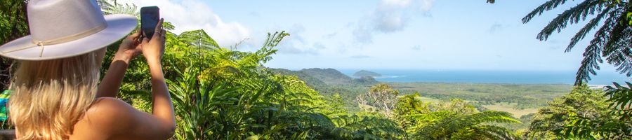 Woman taking photo of view at Alexandra Lookout