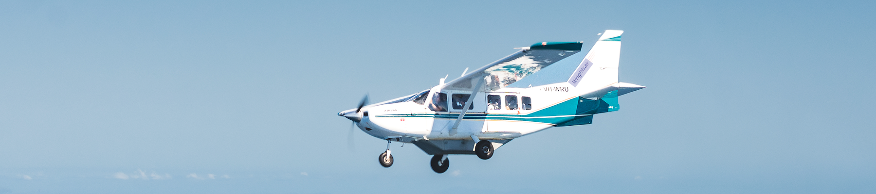 a shot of a scenic flight plane in the sky