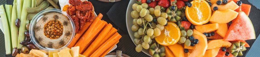 Food platter with fruit, cheese, crackers