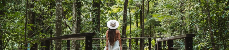 Central Station woman walking through the rainforest at central station