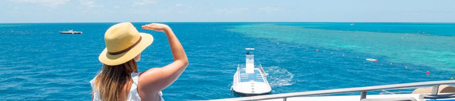 Woman looking out from the Reefsuite boat