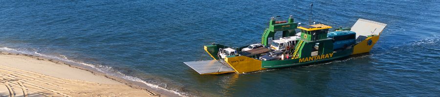 Inskip Point Ferry manta ray barge crossing the ocean to kgari