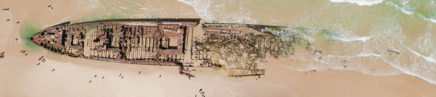 Maheno Shipwreck A top down shot of a shipwreck washed up on the beach