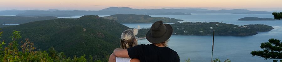 Hamilton Island couple looking at islands from a viewpoint
