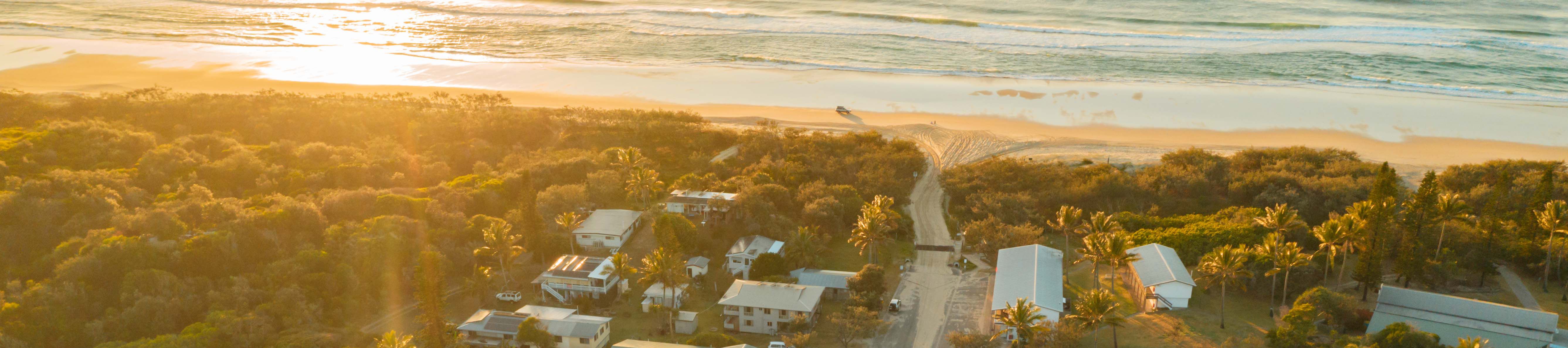 aerial view of kgari beach resort and sunrise