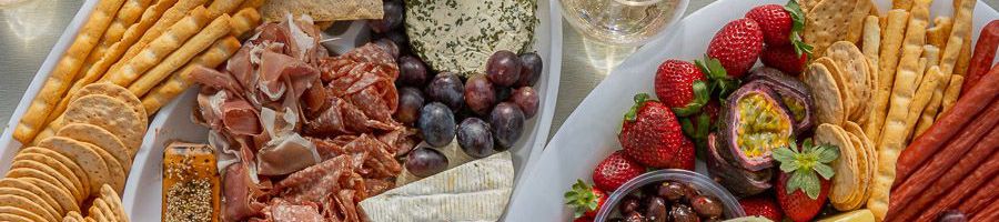 Decadent Platter food platter with cheese, dip, crackers, fruit and more