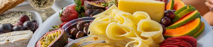 Cheese with fruit and crackers