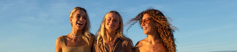Sunset Add On Three girls standing in golden sunset light