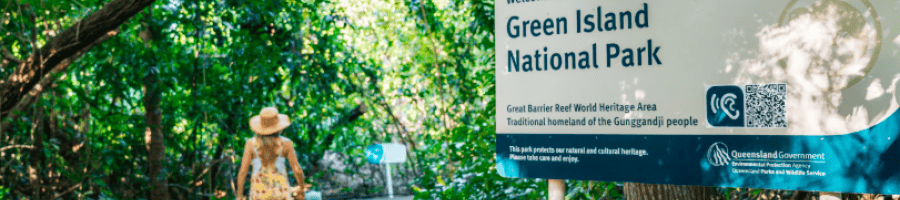 Family exploring Green Island 