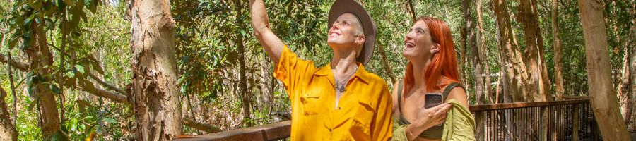 Two people in Forest and park at Hartley's wildlife zoo