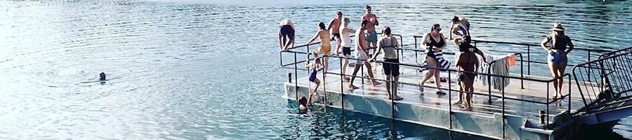 Group of people on the platform at Lake Eacham, Cairns