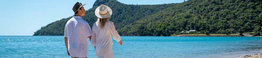 couple walking on hamilton island