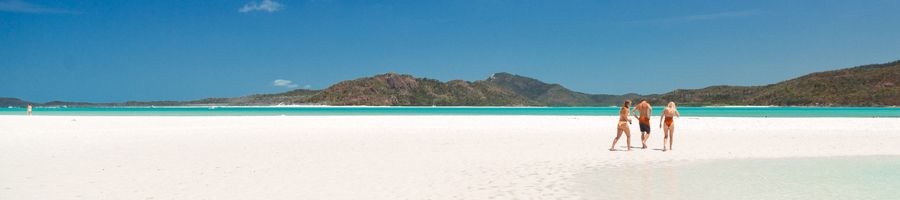 Whitehaven Beach, Purely Whitehaven Half-Day Tour Three people walking along Whitehaven Beach