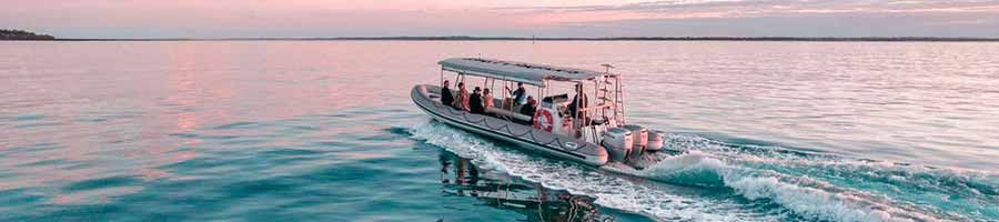 boat on the water at sunset