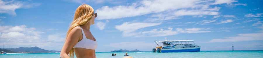 Whitsunday Bullet girl looking at boat