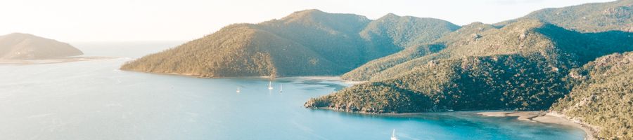 aerial view of rugged whitsunday islands and blue ocean