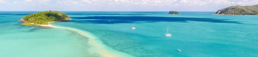 Langford Island Whitsundays aerial view of Langford Island and its golden sands and turquoise waters