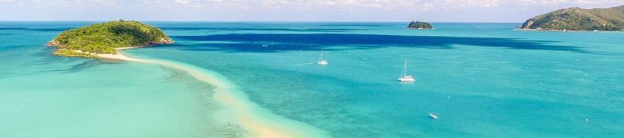 tropical islands, golden sands, and turquoise waters