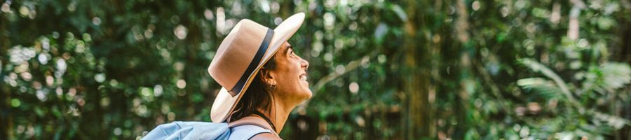 A woman admiring the rainforest views in Cairns