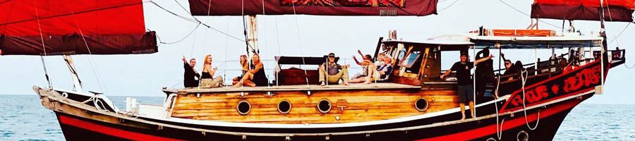 Shaolin Sunset Sail Shaolin Junk Boat at sunset with sails up