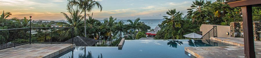 at Waters Edge Resort pool overlooking the water in Airlie Beach