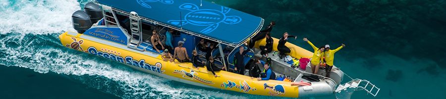 Ocean Safari boat speeding through the water