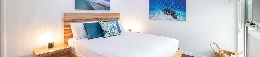 at Marina Shores hotel bedroom with modern furnishings