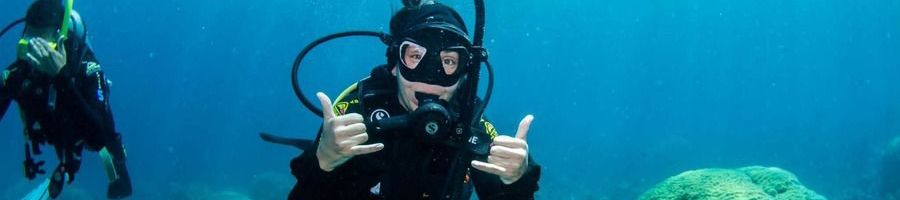 scuba divier on the great barrier reef near cairns
