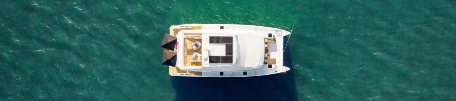 Ginger Luxury Yacht aerial view of ginger luxury yacht on the turquoise ocean