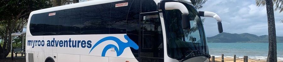 Courtesy transfer bus in Mission Beach, Queensland Courtesy transfer bus from Mission Beach accommodation to Clump Point Marine Facility