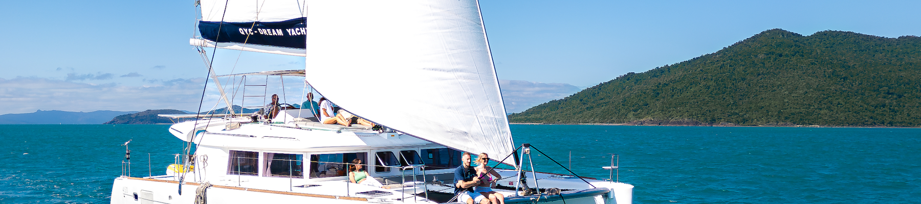 Whitsunday Pearl A catamaran sailing through the ocean