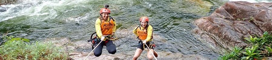 Two friends abseiling in Cairns