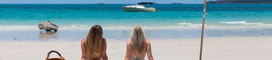 Whitehaven Beach, Whitsunday Island Two young people on Whitehaven Beach