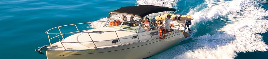 Salty Yacht Whitsundays A motor yacht cruising through the water