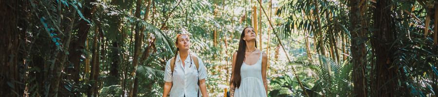 Two women walking through Cairns Botanic Gardens
