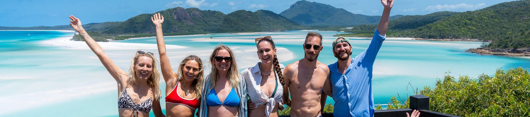 A group of friends at an ocean viewing look out