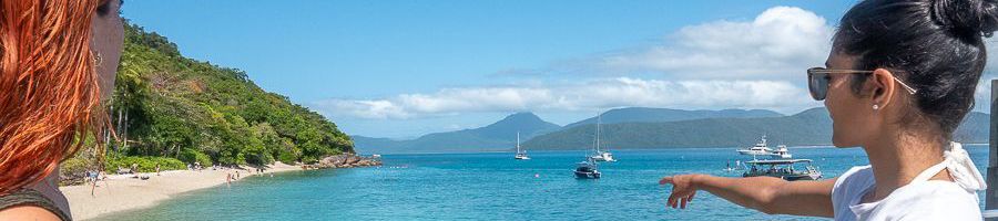two girls admiring the shores of fitzroy island