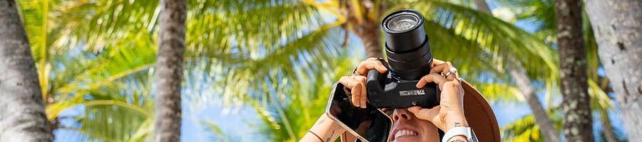 A woman taking photos in Cairns