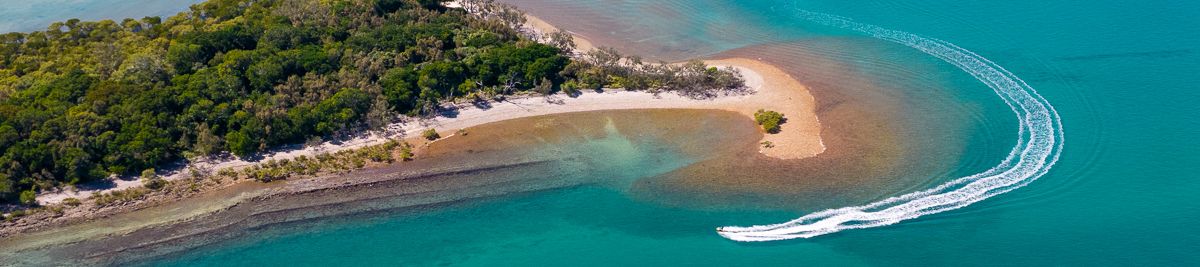 boat riding around islands in the great sandy strait