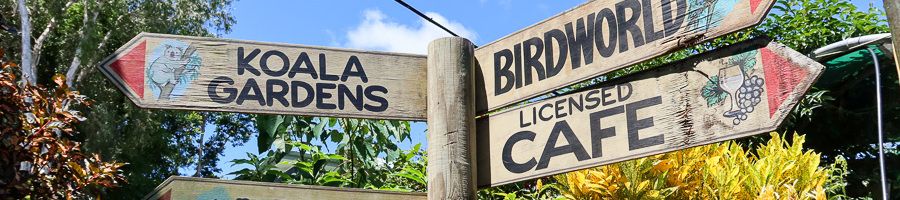 Kuranda Village, Cairns Sign posts for different attractions in Kuranda Village